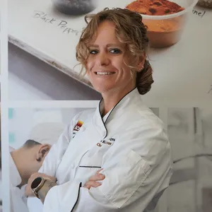McKinzie Bridges in chef whites at the ICE LA campus.