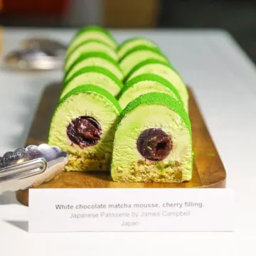 White chocolate matcha mousse with cherry filling