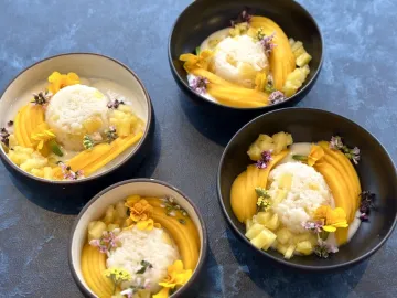 Four bowls of fermented kaffir pineapple coconut rice. 