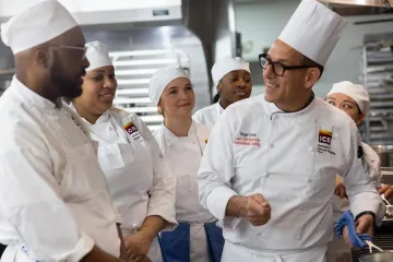 Students in a kitchen classroom. 