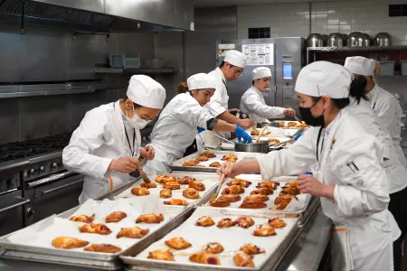 ICE students prepare colorful croissants