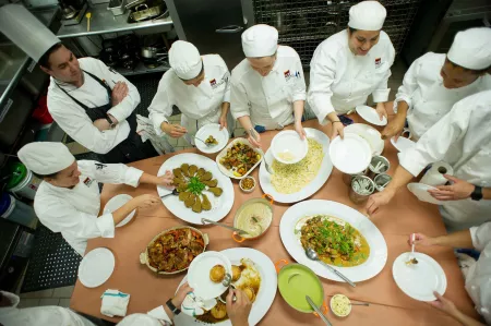 Students taste the food they made in the culinary arts campus programs at the Institute of Culinary Education