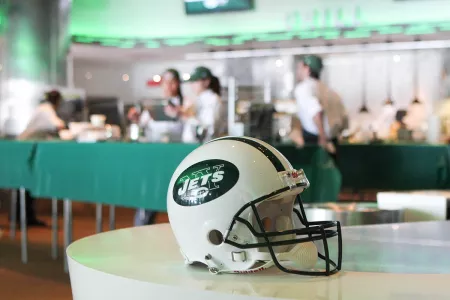 A Jets helmet at a cooking event.