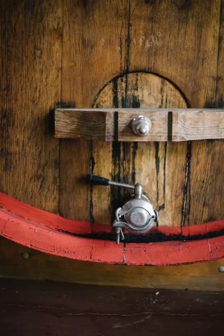 Balsamic aging barrel with a spout.