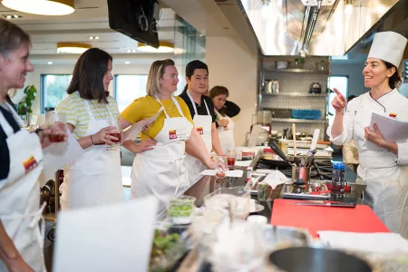 Chef Celine leads a hands-on cooking event.