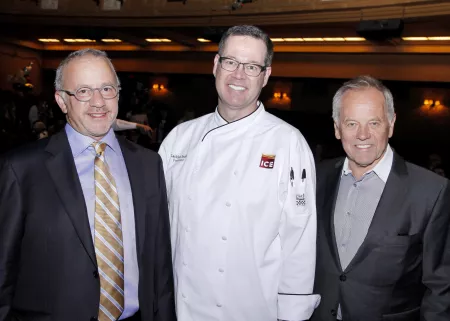 Rick Smilow, Lachlan Sands and Wolfgang Puck visit before the ceremony.