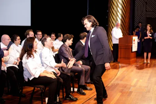 A student shakes hands at the Institute of Culinary Education 2017 commencement ceremony