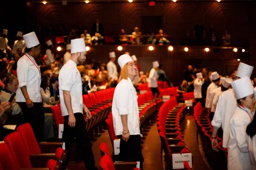 Students line up to enter the auditorium during the processional at the Institute of Culinary Education 2017 commencement ceremony