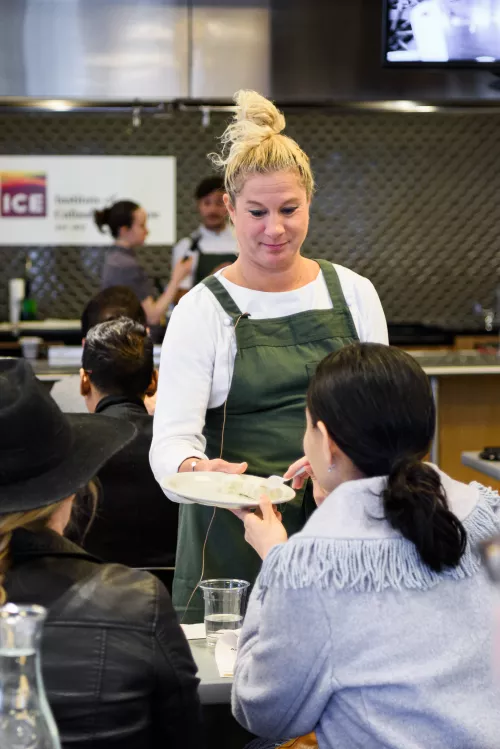 Chef Ana Ros sharing ingredients from Slovenia with ICE students, photo by Alex Shytsman