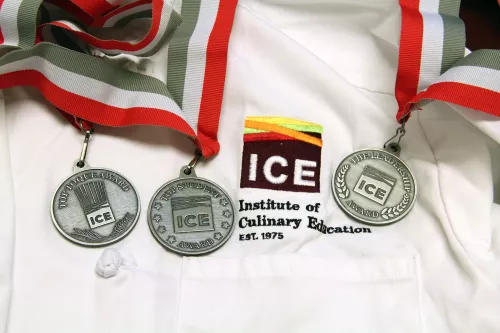 The awards medals with an ICE chef jacket