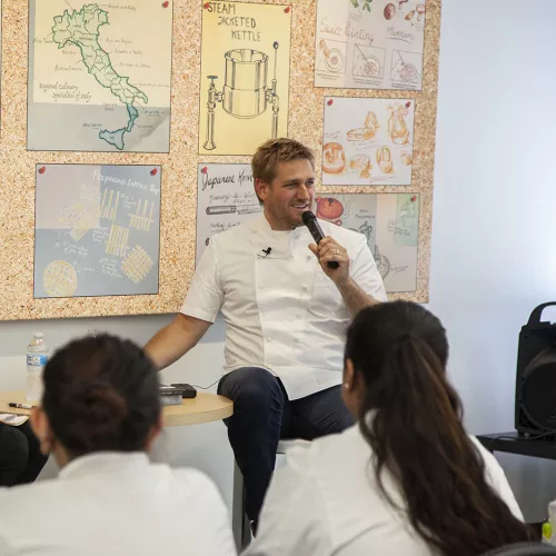 Curtis Stone speaks to students at ICE.