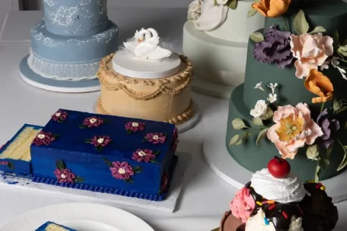 Multiple decorated cakes in ICE's Professional Cake Decorating continuing education program.
