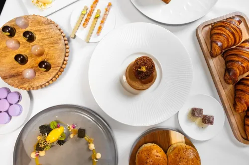 an array of desserts and baked goods highlighting the various techniques taught in the Advanced Pastry & Baking Technique course