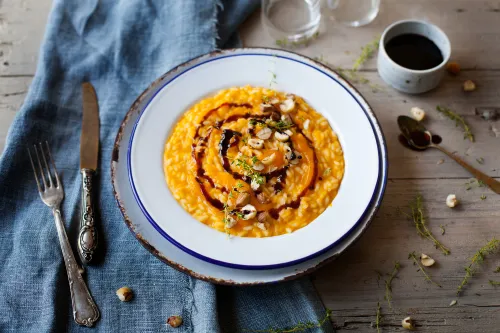 Balsamic vinegar atop risotto.