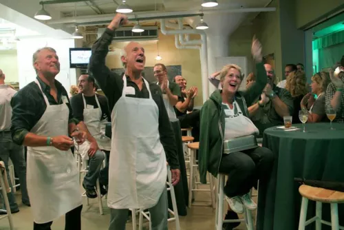 Jets fans in the kitchen.