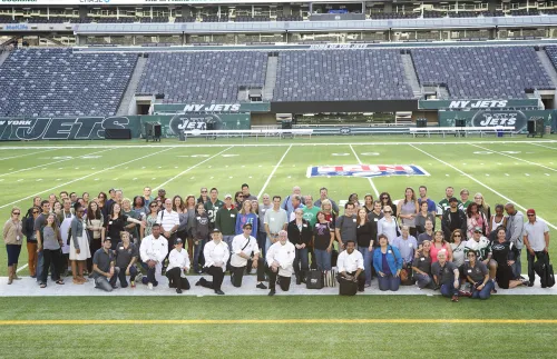 Fans on the Jets' field.