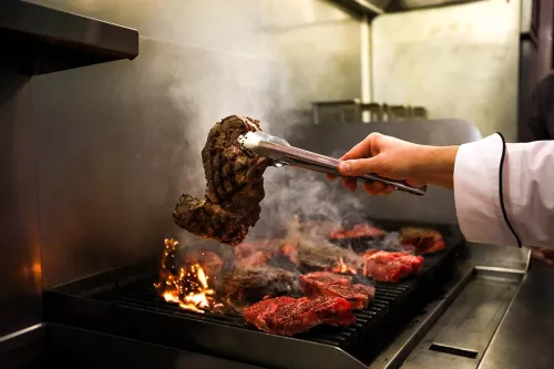 A steak pulled off the grill at a Jets event.