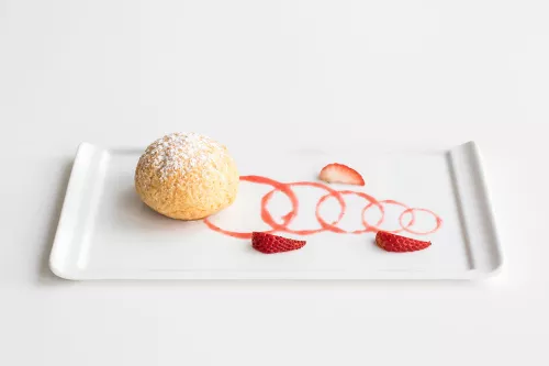 Plated dessert of crunchy choux pastry and strawberries prepared by ICE pastry arts and baking artsstudents