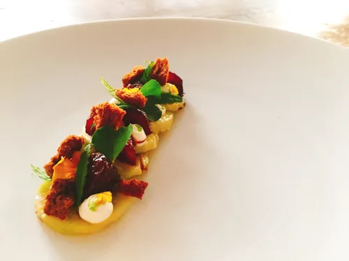 Salt baked celery root with balsamic poached figs and balsamic meringue.