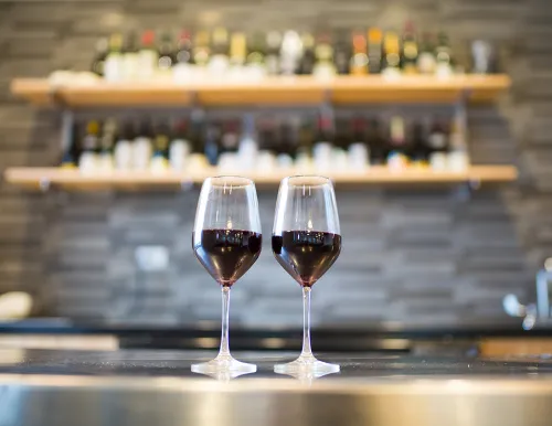 Two glasses of red wine at ICE's bar.