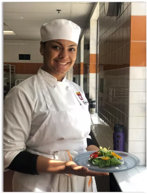 ICE Los Angeles plant-based culinary arts student presenting dish