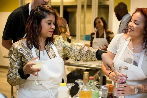 Guests making cocktails in the Mixology Center at the Institute of Culinary Education