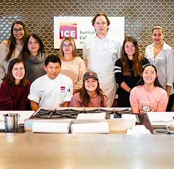 Students gather for a photo with Chef Paul Liebrandt