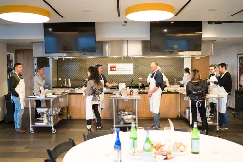 Guests make sushi at an event.