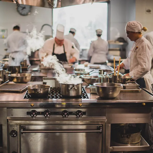 Students in a kitchen classroom. 