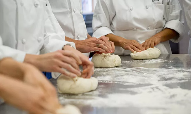 Pastry Arts program students prepare doughs at the Institute of Culinary Education