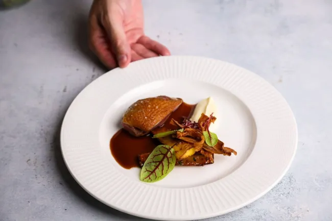 chef presenting dish
