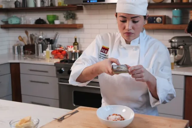 online culinary student takes photo of gnocchi