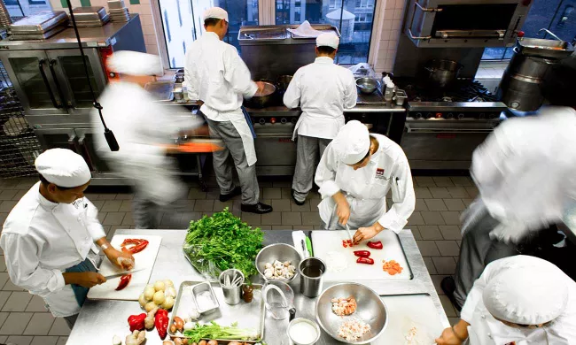 ICE Students get experience in professional kitchens with real world externships built into the culinary arts campus programs.