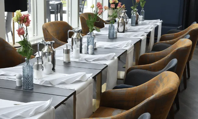 Inside a modern looking restaurant dining room. 