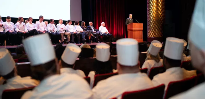 Dan Barber speaks at ICE's 2019 graduation commencement in New York.