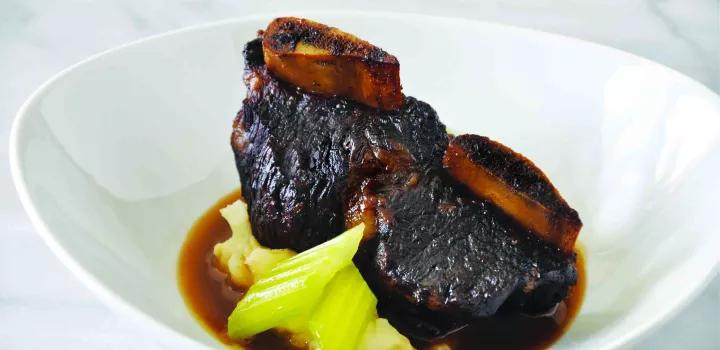 Plated short ribs and celery