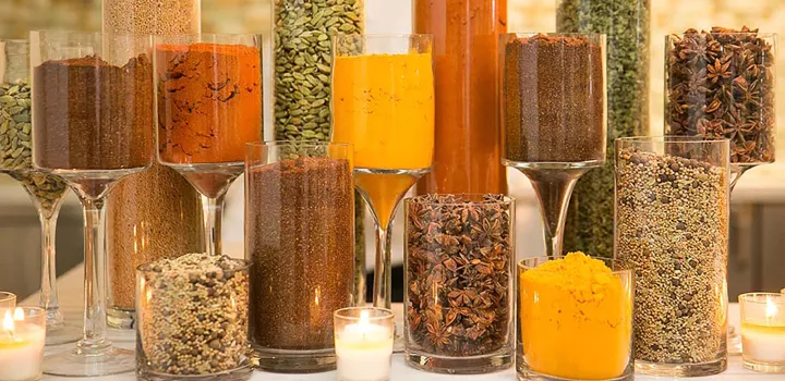 jars filled with a variety of cooking spices