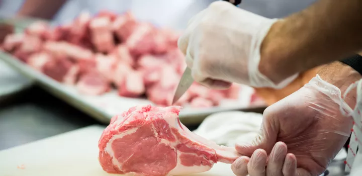 chef butchering veal