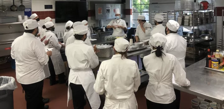 Chef-Instructor Alan Kang with students