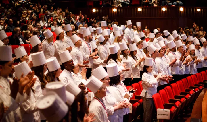 Culinary school students celebrate their graduation ceremony from the Institute of Culinary Education