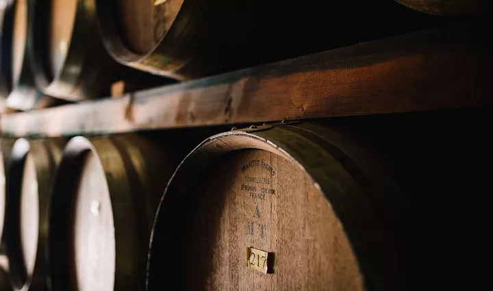 Balsamic vinegar ages in barrels.