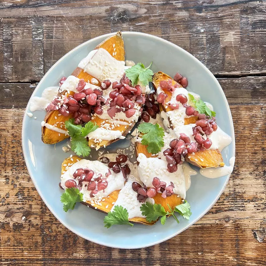 Loaded Sweet Potato with Fermented Pomegranate Ginger Salsa & Whipped Tahini